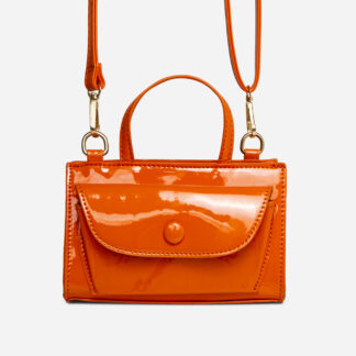 Saint Top Handle Cross Body Saddle Bag In Orange Patent,, Orange