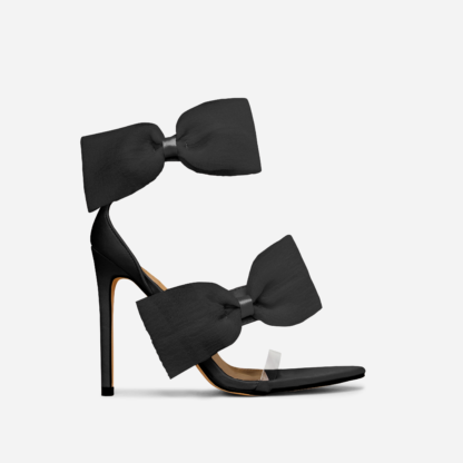 Elvie Clear Perspex Strap Oversized Bow Detail Pointed Toe Stiletto Heel In Black Satin, Black