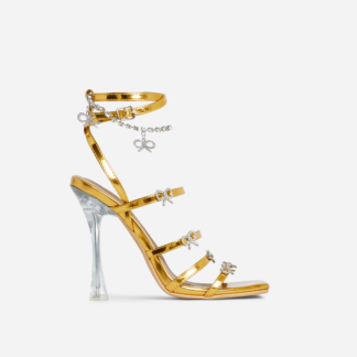 Maeve Strappy Diamante Bow Detail Square Toe Clear Perspex Heel In Metallic Gold Faux Leather, Gold