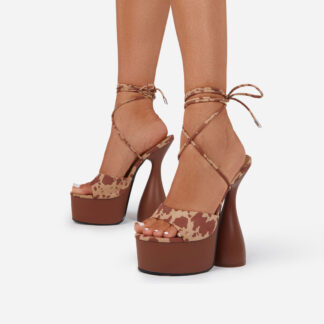 Bite-Me Lace Up Peep Toe Platform Statement Heel In Brown Cow Print Faux Suede, Brown