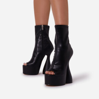 Aila Peep Toe Platform Statement Heel Ankle Sock Boot In Black Faux Leather, Black
